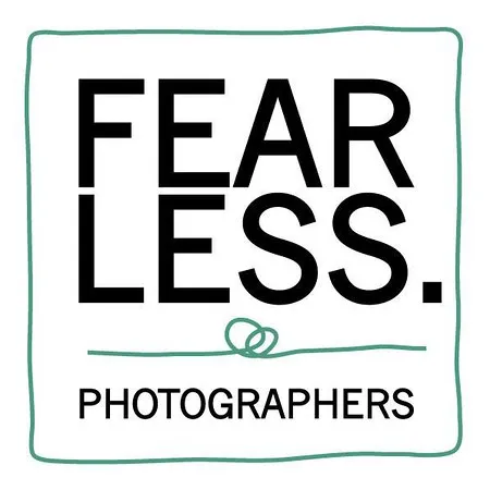 Logo with the words “FEARLESS. PHOTOGRAPHERS” in bold black letters, framed by a thin, uneven green outline with a small looped flourish underneath “FEARLESS. Copyright Somerside Photography Ltd // www.somersidephotography.com